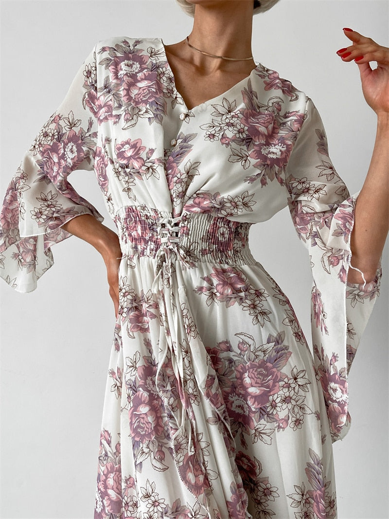 Elegant blommig aftonklänning